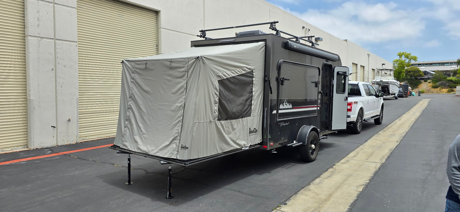 Toy Hauler Patio Ramp Tent by PahaQue for the Intech Discover Trailer